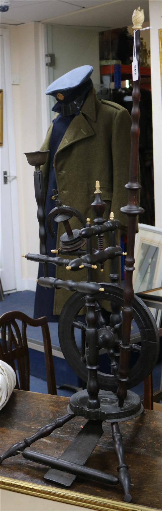 A Victorian ebonised and ivory spinning wheel